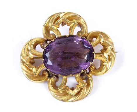 A Victorian amethyst gilt-metal brooch, with pierced foliate settings, brooch length 45.8mm, 17.1g 