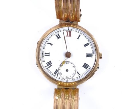 A Vintage 9ct gold mechanical wristwatch, white enamel dial with Roman numeral hour markers and subsidiary seconds dial, case