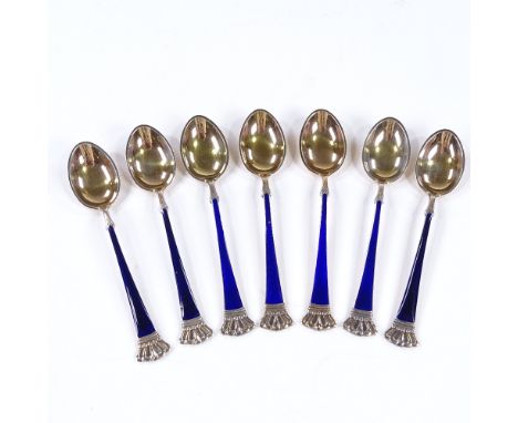 A set of 7 Danish sterling silver-gilt and blue enamel coffee spoons, with crown terminals, by ELA, length 9.5cm 