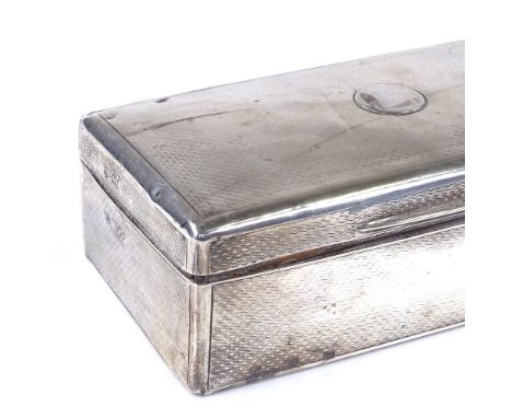 A George V rectangular silver cigarette box, with engine turned decoration, by Stewart Dawson &amp; Co Ltd, hallmarks London 