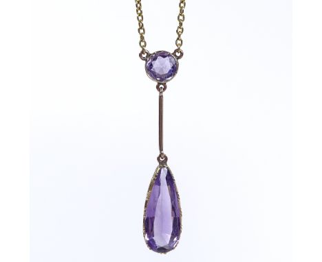 An Edwardian 9ct gold amethyst drop pendant necklace, set with long pear-cut and round mixed-cut amethyst, on 9ct chain, pend
