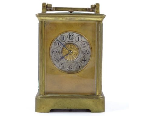 A French 8-day brass-cased carriage clock, with ornate silvered dial, repeat movement striking on a gong, case height 13cm 