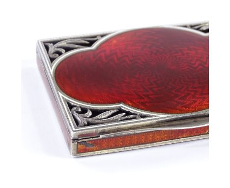 A Continental unmarked silver-gilt and red guilloche enamel card case, with zig-zag engine turned decoration and foliate pier