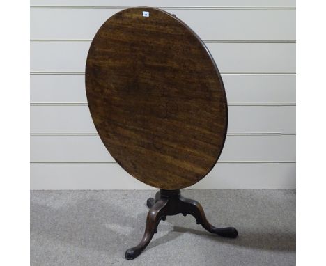 A 19th century circular mahogany occasional table on carved tripod base, 3' across 