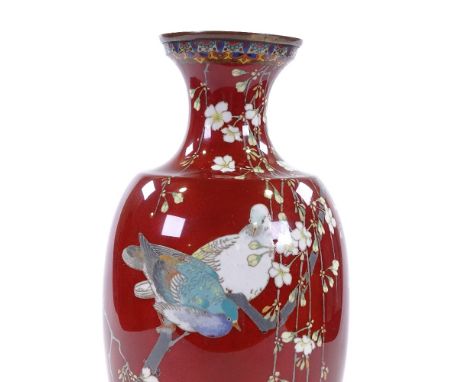 A Japanese cloisonne enamel red ground vase, with detailed exotic bird decoration, height 37cm 