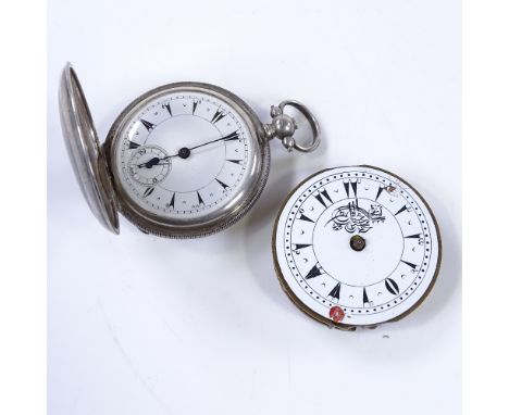 A Turkish silver full hunter pocket watch, with engine turned case, case width 45mm, together with another Turkish pocket wat