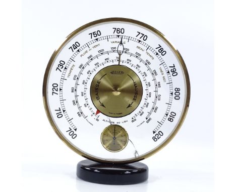 A Jaeger desk-top barometer with inset thermometer dial, 16cm diameter, glass cracked 