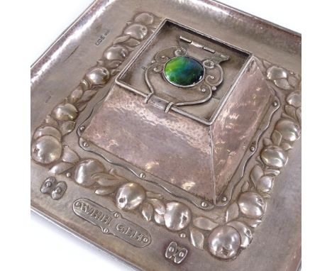 NEWLYN - a rare George V silver and enamel square inkwell desk stand, with central Ruskin panel, stylised borders, relief emb