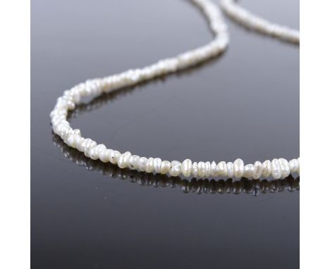 A single-strand Matinee seed pearl necklace, with unmarked gold clasp, necklace length 21", 5g 