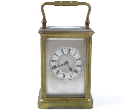 A French 8-day brass-cased carriage clock, enamel dial, 8-day movement striking on a gong, case height 12cm 