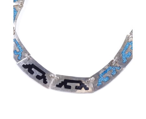 A Mexican sterling silver Aztec design collar necklace, with coloured enamel decoration, maker's marks JCL, necklace length 3