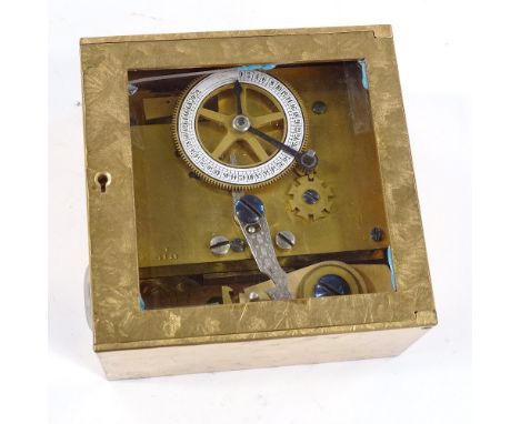 A time lock mechanism for a commercial safe, by Sargent &amp; Greenleaf, with brass movement and enamel dial, in glazed brass