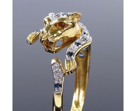 An 18ct gold Cartier Panthere style sapphire and diamond ring, import marks for Addis &amp; Co, hallmarks London 1990, settin