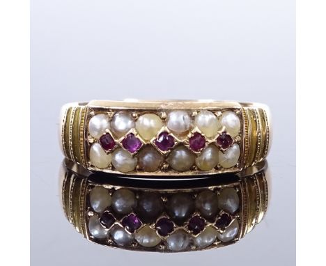 A Victorian 15ct gold split-pearl and ruby dress ring, with ribbed shoulders, by Victor Levy &amp; Co, hallmarks Birmingham 1