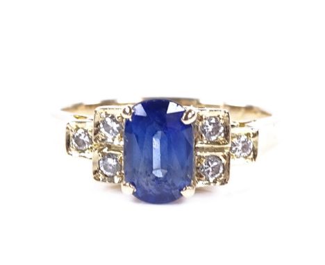 A 14ct gold sapphire dress ring, with stepped diamond set shoulders, sapphire approx 1ct, size H, 2.4g 