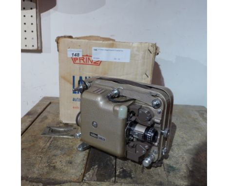 SOLD IN TIMED AUCTION A Lancer vintage projector in original box