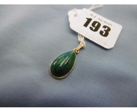 A 14ct gold pendant, possible set with Jade,