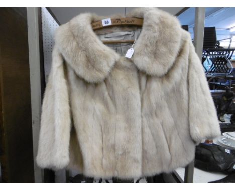 A short blonde mink coat