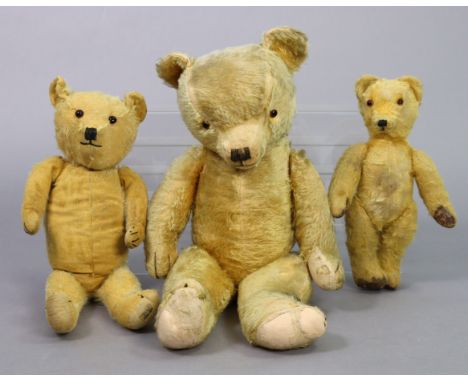 A vintage Merrythought Hygienic Toys teddy bear, 21½” tall; together with two other vintage teddy bears, 27”, &amp; 14½” tall