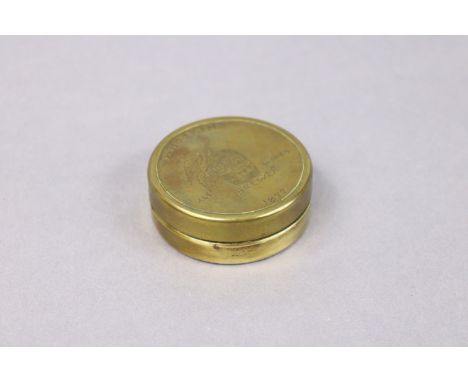 A 19th century style brass circular snuff-box inscribed to lid “T. Hoskins Brewer, 1877”, having verse to the interior, 2½” d