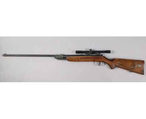 A Jelly .55 calibre air rifle with a B.S.A air rifle scope