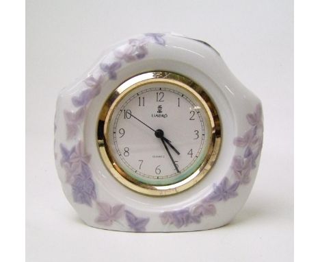 Lladro mantle clock: decorated with leaves 