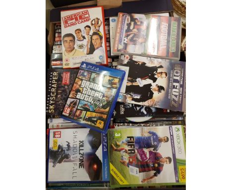 A collection of DVD's and console games: 1 tray.