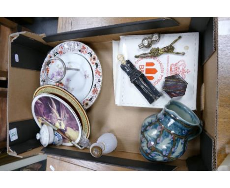 A mixed collection of items to include: Studio pottery jug, Silver plated rattle, reproduction Lorenzl type figure, opium pip