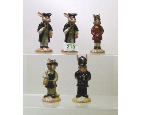 Royal Doulton Bunnykins figures to include: DB57 Schooldays, DB60 Schoolmaster x 2,  DB61 Brownie and DB64 Policeman (5)(most
