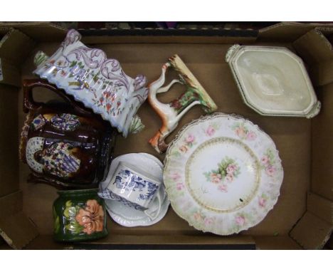 A mixed collection of ceramic items to include: Measham barge teapot, Faiance planter, Staffordshire greyhound, Moorcroft sma