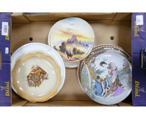 A mixed collection of items to include: Oriental Theme Wall Plates, French comical item, Royal Doulton &amp; similar commemor