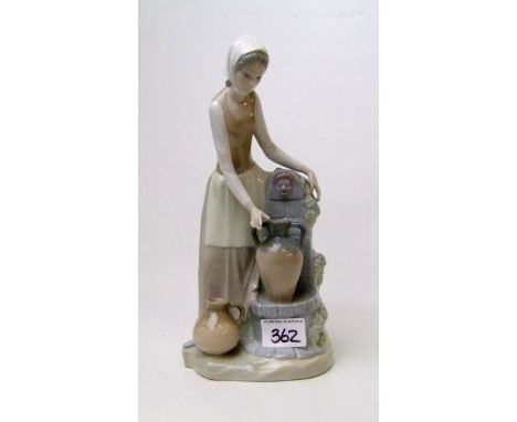 Lladro / Nao figure of a lady collecting water: 