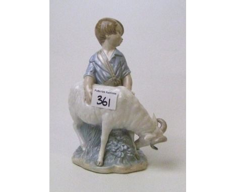 Lladro / Nao figure of a boy with a goat: 