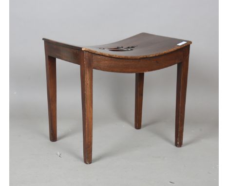 A George III mahogany stool, the curved seat with pierced centre, on square tapering legs, height 46cm, width 52cm, depth 37c