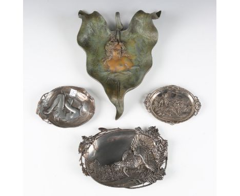 A WMF Art Nouveau style pewter dish, relief cast with a semi-nude female figure, numbered '227', width 16cm, another similar 