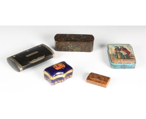 A 19th century black lacquered and nickel mounted snuff box of oval section, width 10.5cm, a small burr wood snuff box, anoth