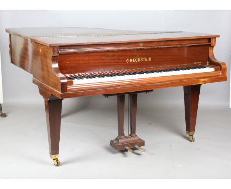A mahogany cased L model baby grand piano by C. Bechstein, circa 1934, serial number '139888', bearing 'Harrods' retailer's l