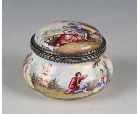 A 19th century French enamel box and cover depicting courting couples and figures at leisure in a landscape, with matching in