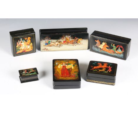 A 20th century Russian papier-mâché rectangular box, the lid painted with a winter scene of two horse-drawn troikas, signed, 