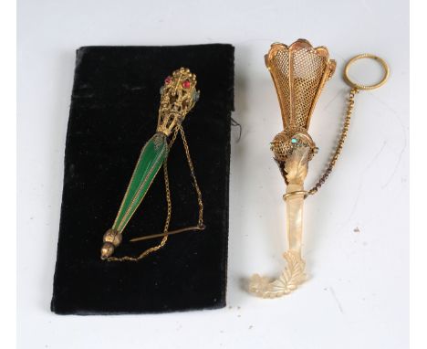 A late 19th century gilt metal and mother-of-pearl posy holder with applied turquoise roundels, length 12.5cm, and another gi