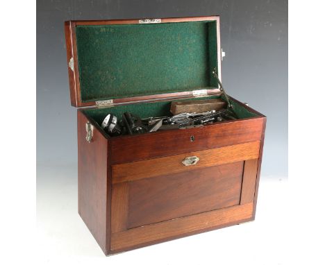An early 20th century mahogany portable tool chest, with carry handle to the hinged lid and a front panel concealing an arran