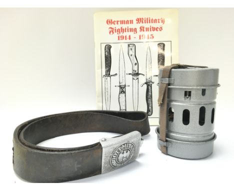 A Collection of German Third Reich items including a Wehrmacht Belt and buckle, Folding camping stove & a German Military Fig