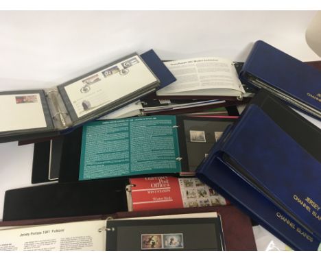 A good collection of Channel Island Jersey and Guernsey presentation stamps and some first day covers (a lot)- NO RESERVE