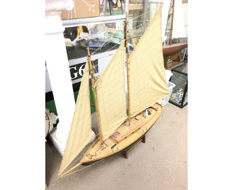 A three mast model boat 115cm tall, 105cm long. Postage category D
