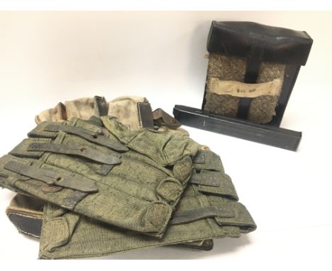 A Collection of WW2 Third Reich military items including magazine pouches and a MP38u.40 magazine. Postage category C