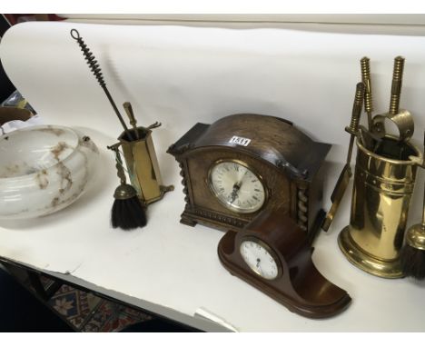 A Vintage opaque glass hanging lamp shade and one other glass lamp shade of Art Deco design and two clocks and brass fire iro