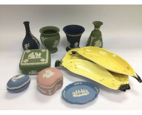 A small collection of ceramics including Wedgwood jasperware, Carltonware dishes and stoneware foot warmers. Shipping categor