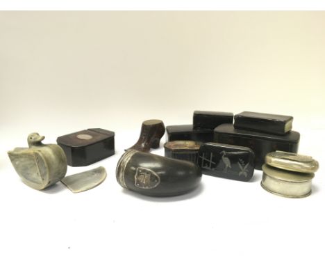 A collection of Victorian snuff boxes including ebonised boxes, snuff mull, shoe box, duck (In need of restoration) etc. Post
