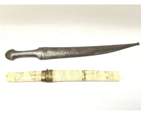 A Chinese engraved bone scabbard dagger and a Persian dagger.