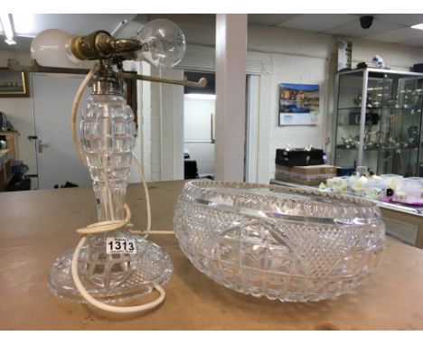 A cut glass table lamp with detachable shade